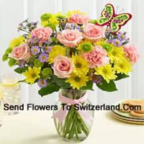 Pink Roses, Pink Carnations And Yellow Gerberas With Seasonal Fillers In A Glass Vase -- 25 Stems And Fillers