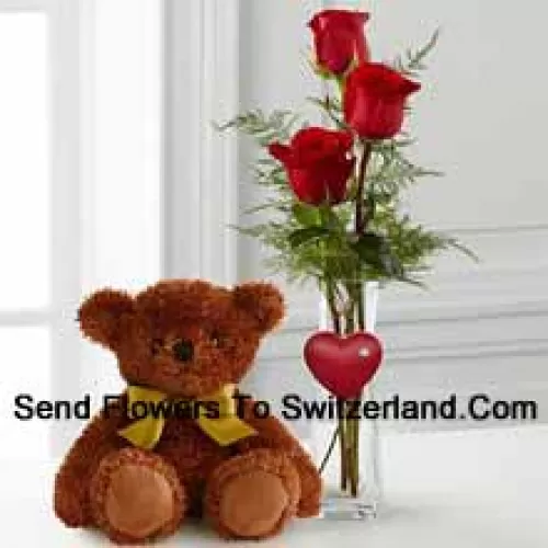 Three Red Roses In A Red Test Tube Vase And A Cute Brown 10 Inches Teddy Bear (We Reserve The Right To Substitute The Vase In Case Of Non-Availability. Limited Stock)